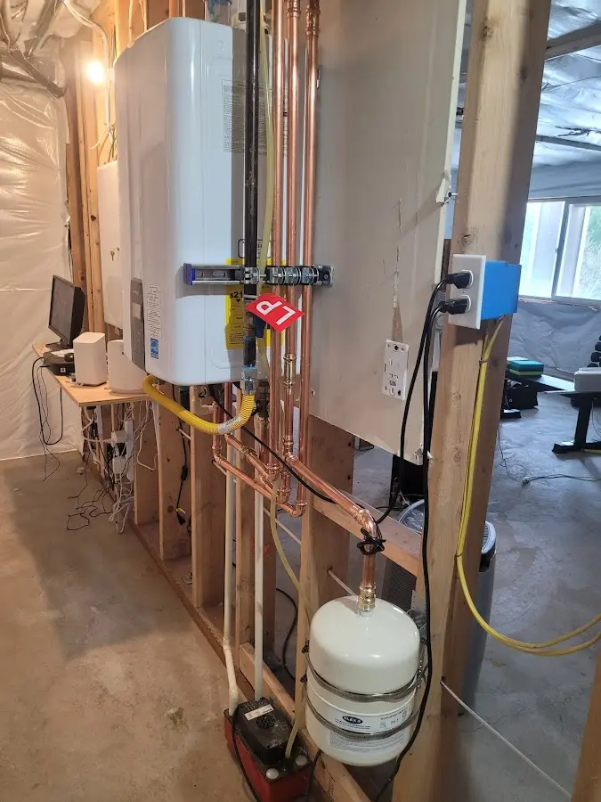 Licensed plumber repairing a kitchen sink in Hawaiian Acres